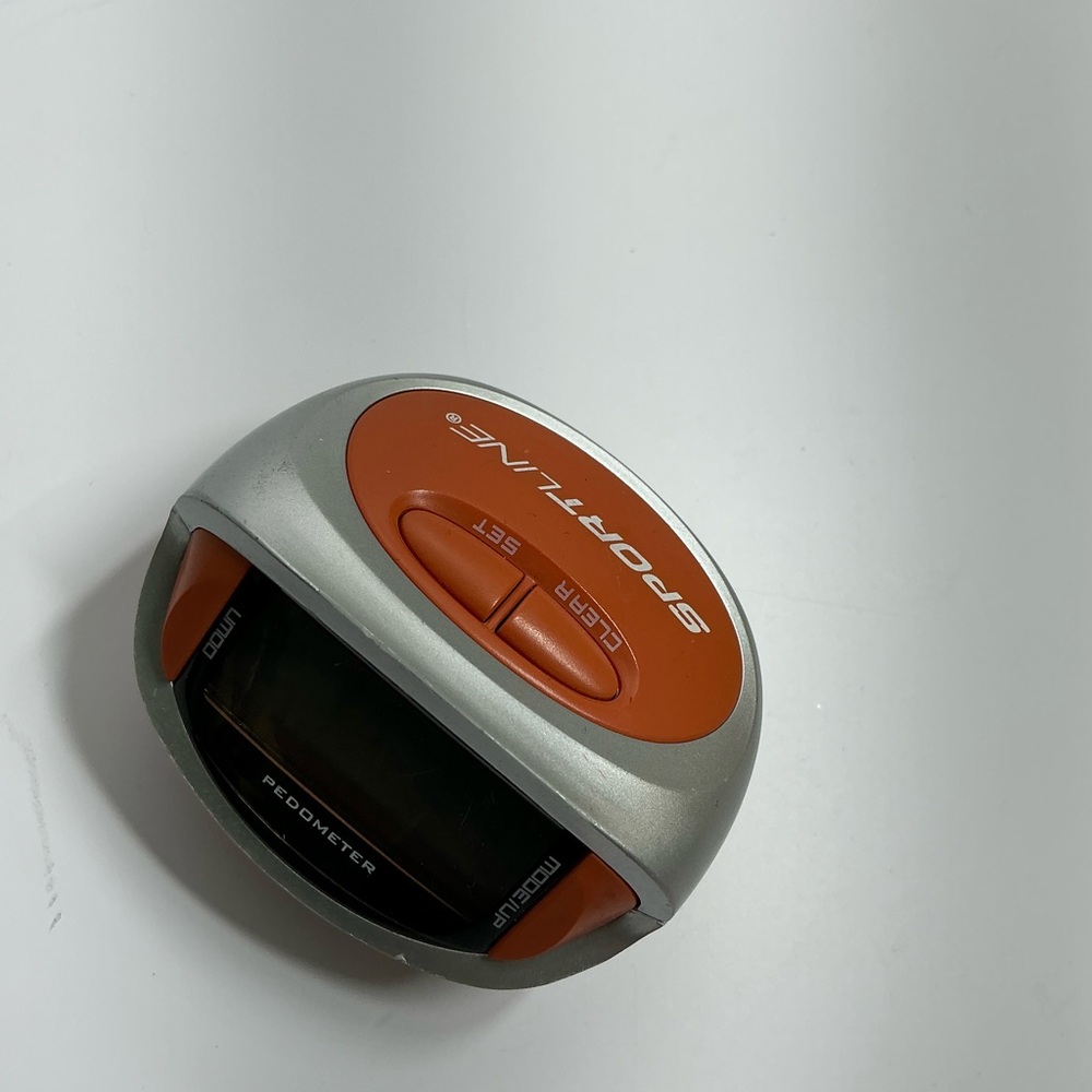 Silver and Orange Pedometer